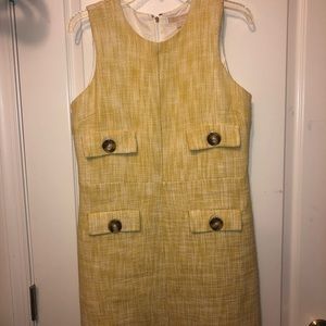 Light yellow dress with tortoise shell buttons